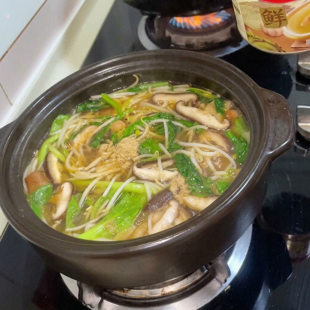 牛肉ダシダを振りかけている様子