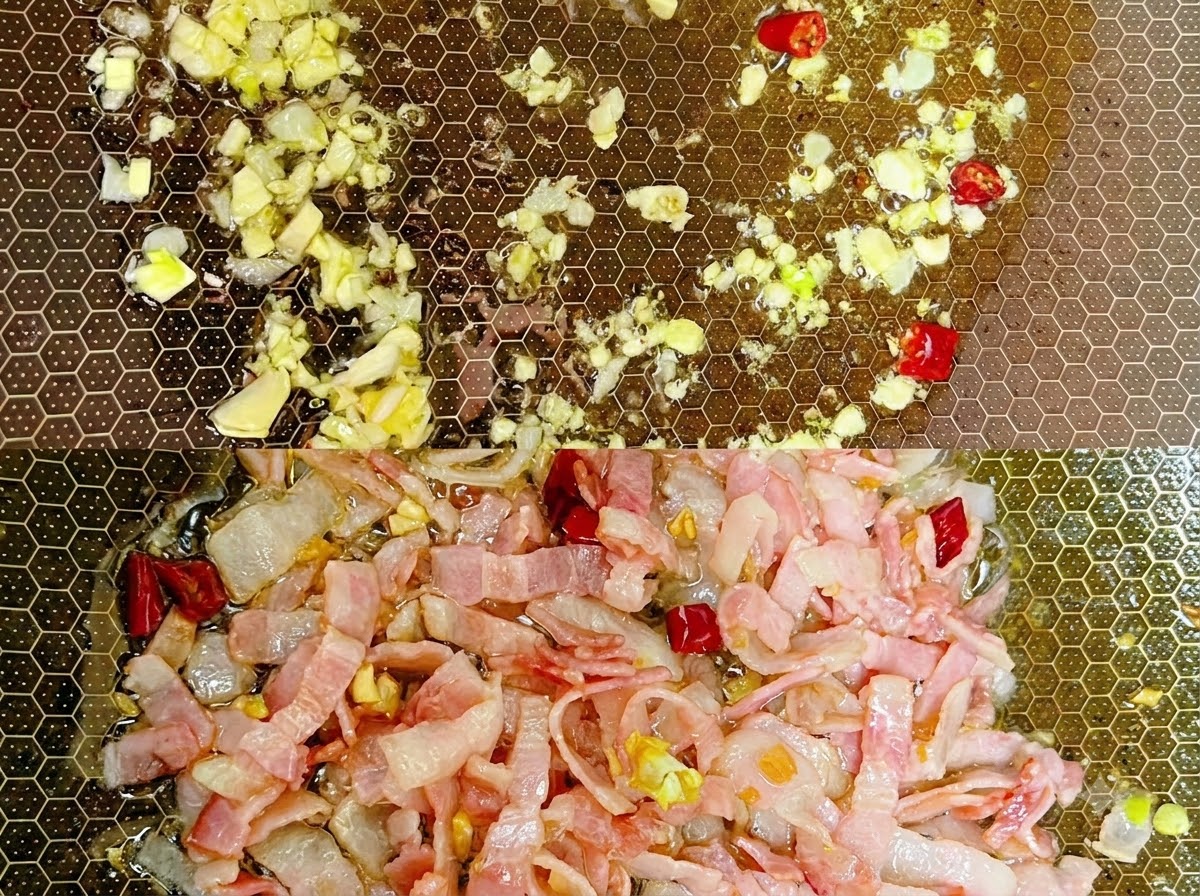 茹で上がったスパゲッティが、調味料と水分とともにフライパンの中で手際よく和えられています。